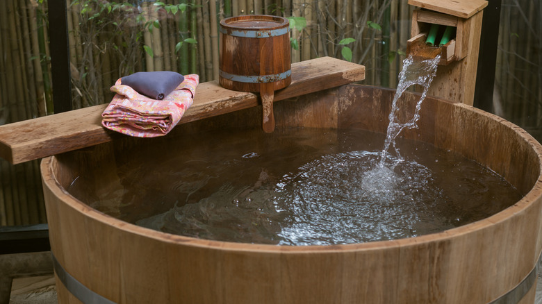 Tradition Japanese ofuro being filled with water
