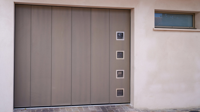 Single tilting garage door on a home