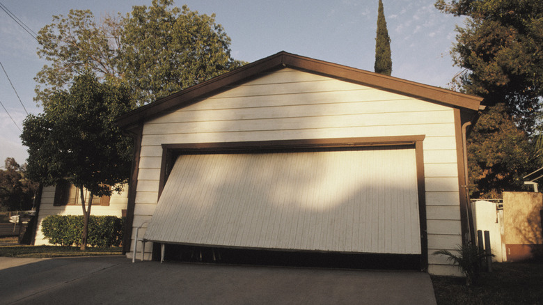 Tilt-out garage doors take up more space in the driveway