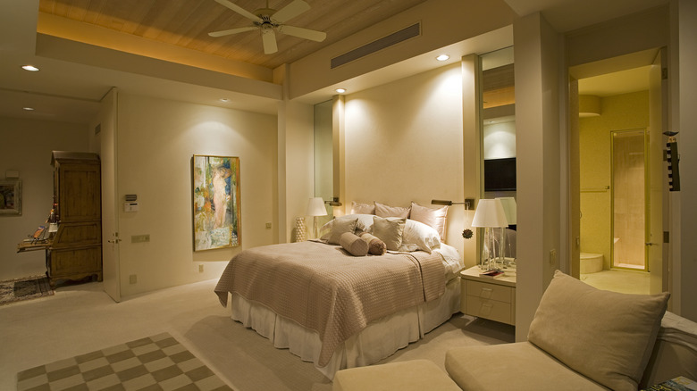 Cozy bedroom with recessed lighting