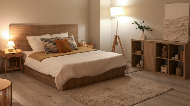 A bed with a wood frame