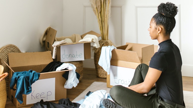 Woman with donation boxes