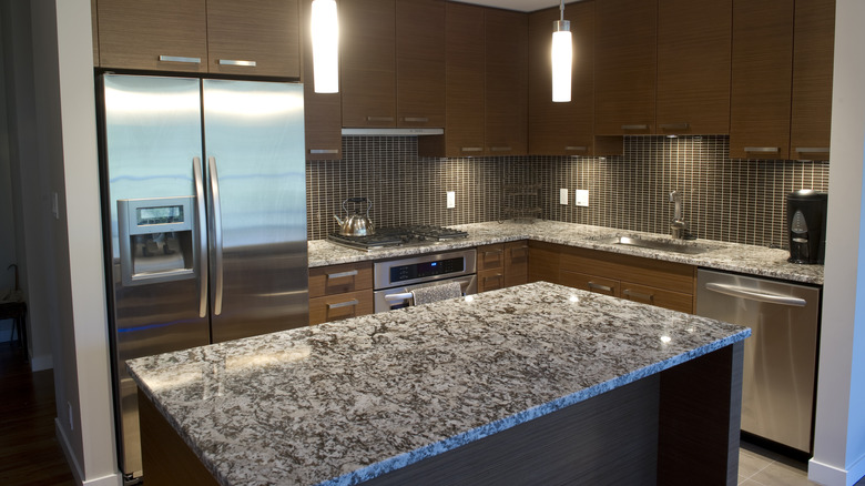 kitchen with granite countertop surfaces