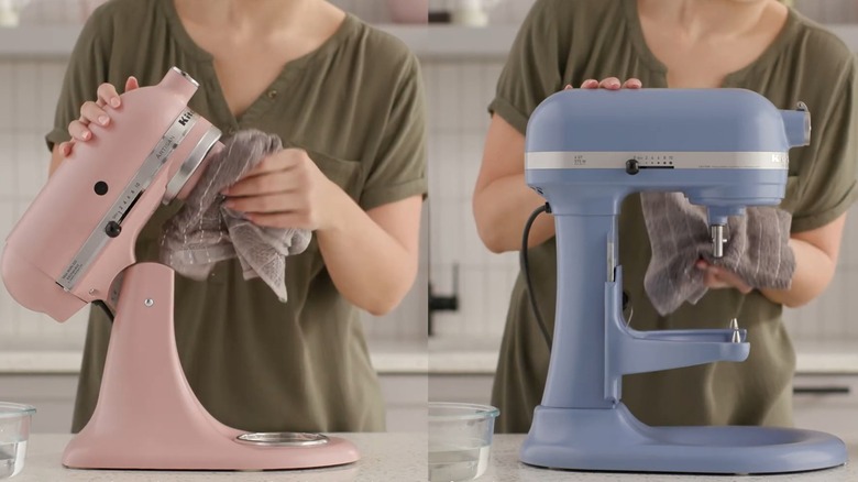 Woman using cloth to wipe bowl-lift and tilt-head KitchenAid stand mixer