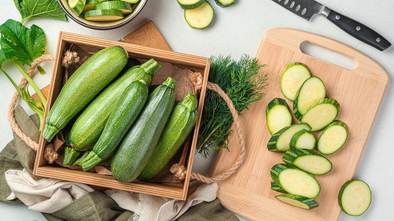 Pile of zucchinis on table