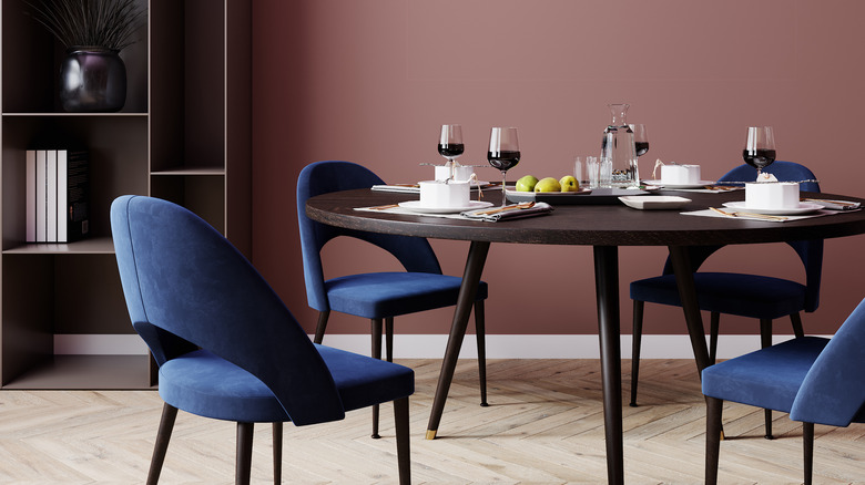 Round table with blue chairs 