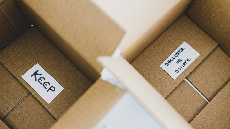 Boxes labeled keep or donate