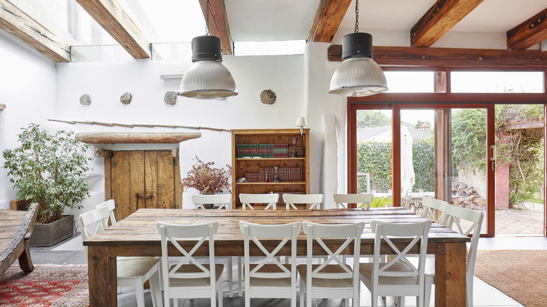 prairie style kitchen with wood beam in it