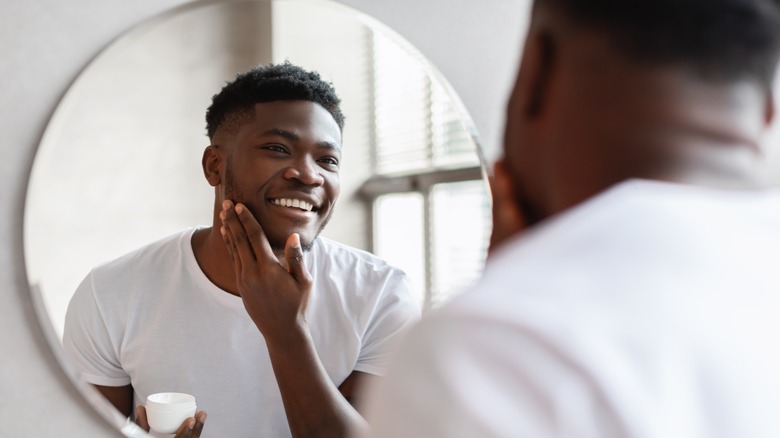 Man looking in mirror