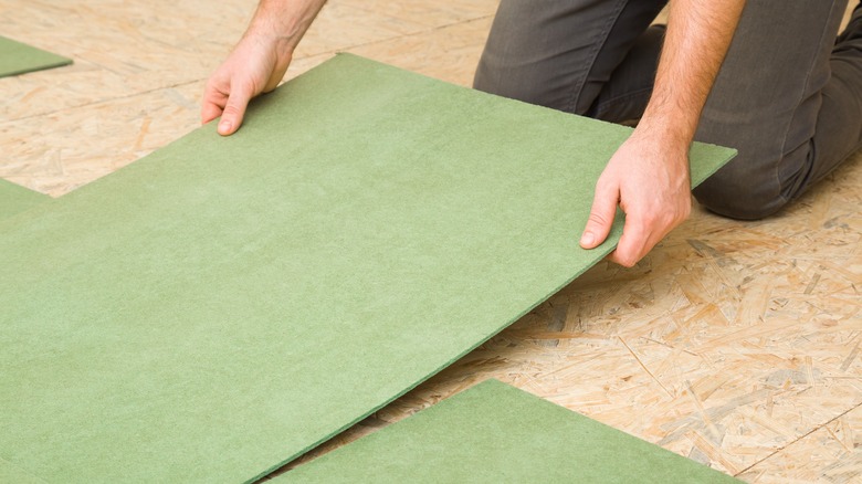 Person installing floors