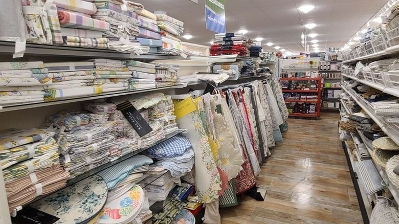 The table linen aisle at a HomeGoods store