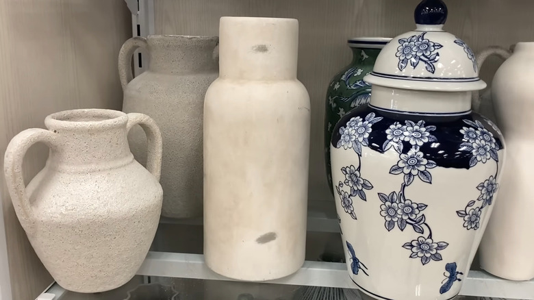A shelf of vases at HomeGoods