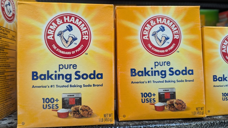 Boxes of baking soda on a store shelf