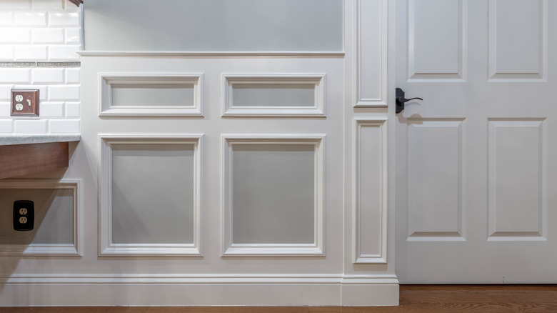 white wainscoting with gray panels