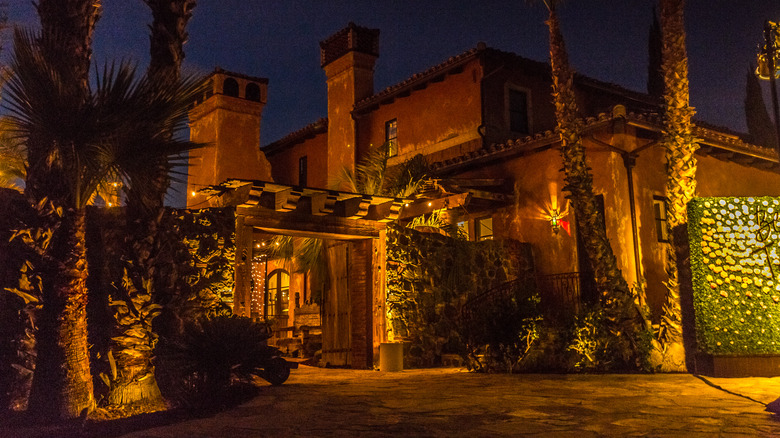 Bachelor mansion at night