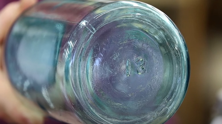 Bottom of a jar with 13 on it