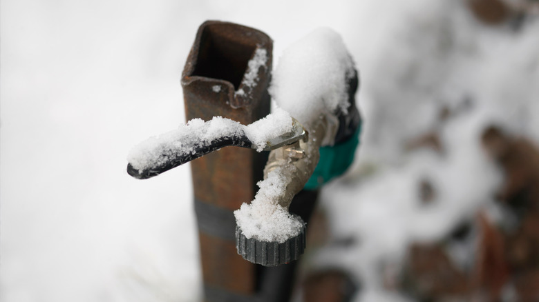 Snowy outdoor faucet