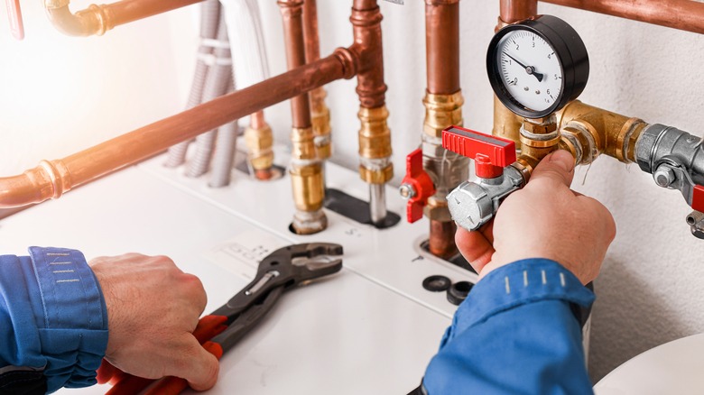 Plumber fixing pressure valves