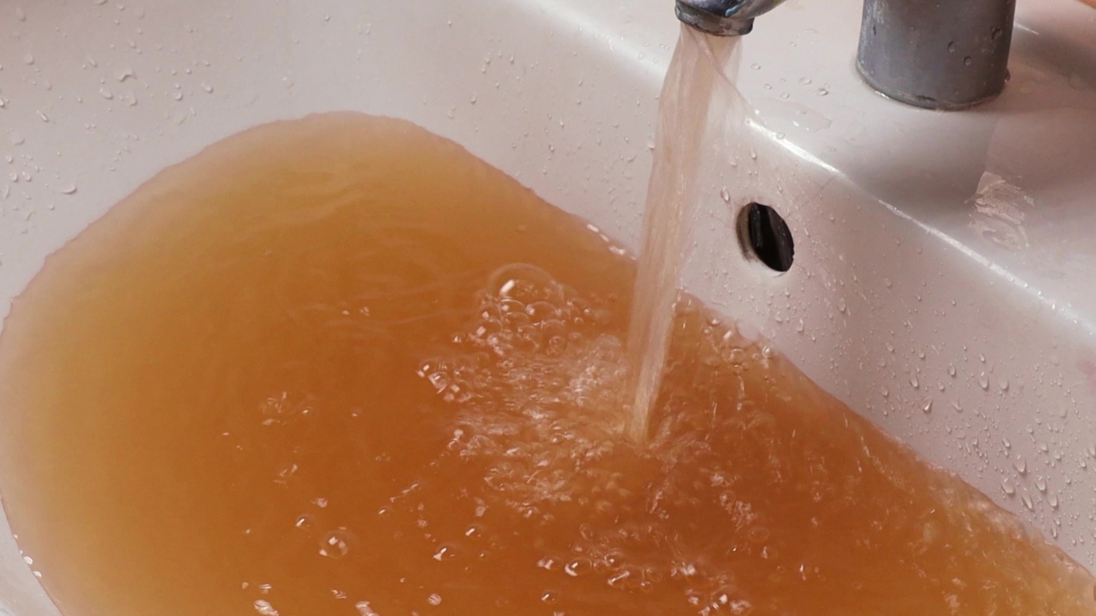 What Red Laundry Water Really Means (And How To Fix It)