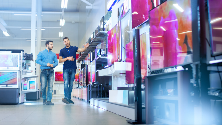 Customer looking at new television