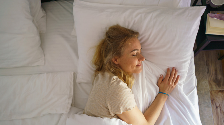 Woman sleeping in bed