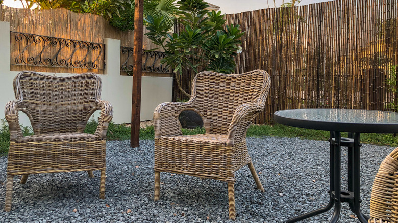 Pea gravel patio with seating area