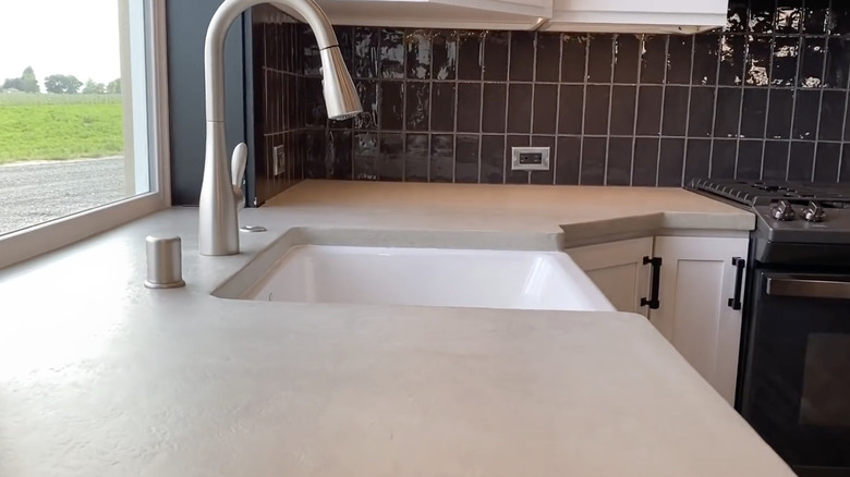 A faux concrete countertop in a kitchen