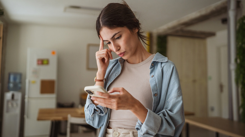 A young woman using her smartphone