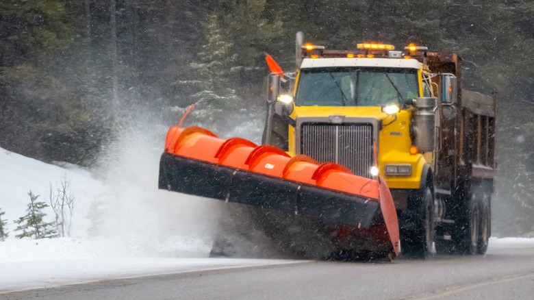 Snowplow removing snow from the road