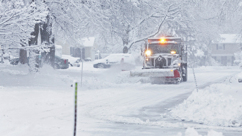 Snowplow working during a snowstorm