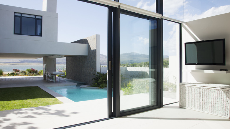 Glass door in front of pool