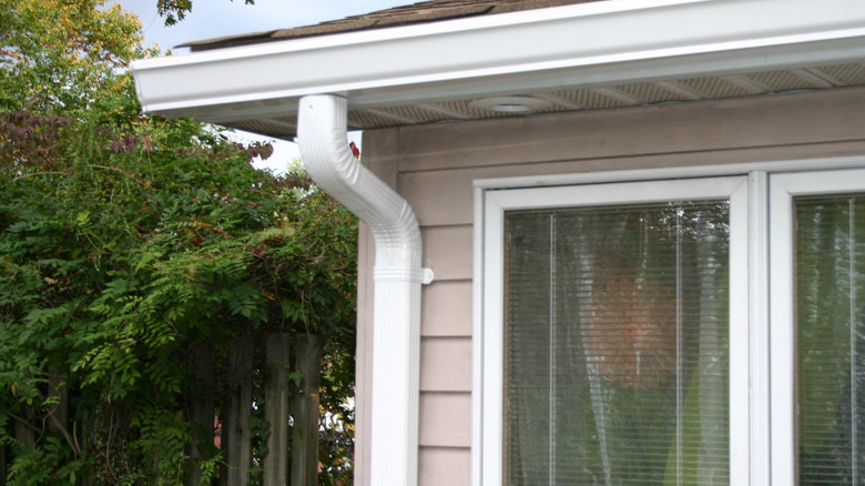 downspout at corner of new house