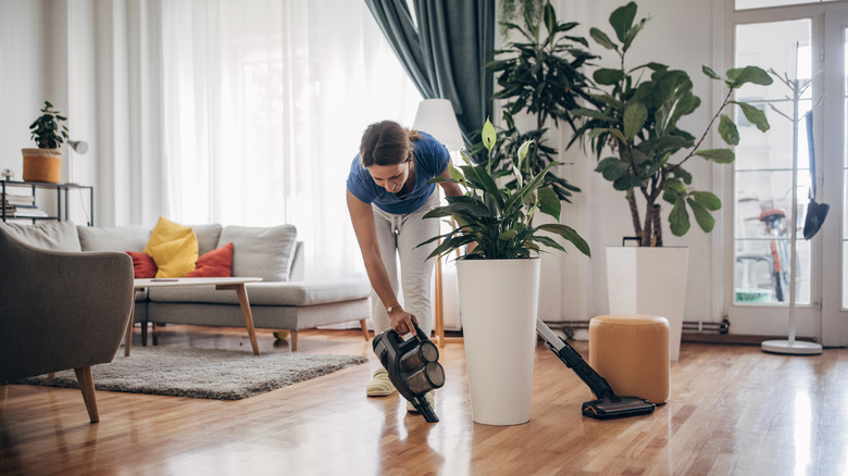 woman cleaning wood floor