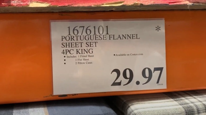 Costco price tag with an asterisk in the upper right corner