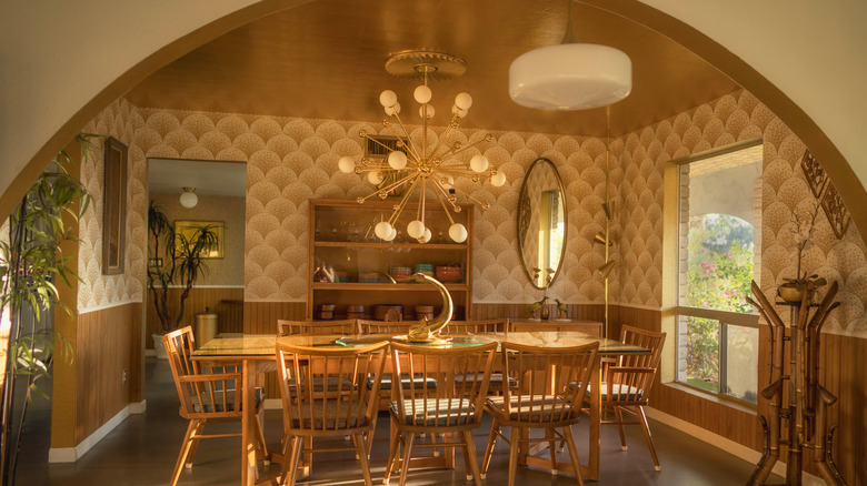Mid century dining room with sputnik chandelier.