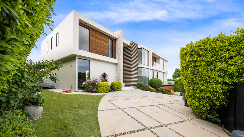 An attractive modern home with a smart paver driveway
