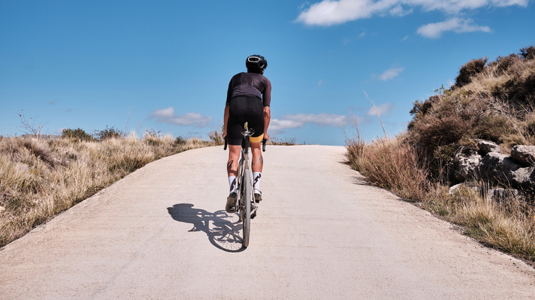 Cyclist riding on a self-binding gravel bike path