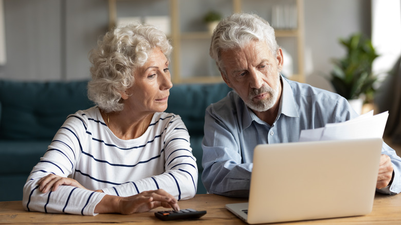older couple looking at paperwork