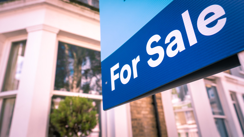 blue for sale sign 