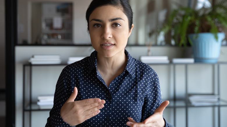 woman negotiating at a meeting