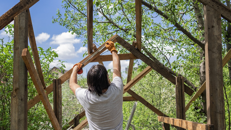 wooden arbor with bench