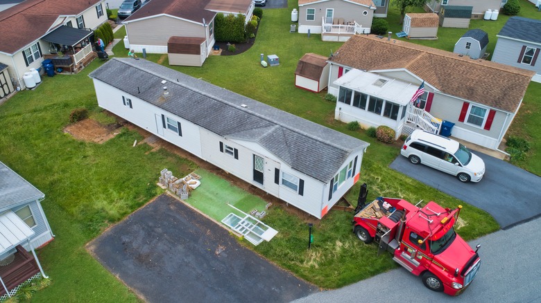 Manufactured home being positioned