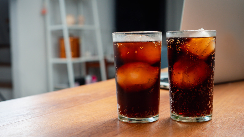 Two glasses of soda in a home kitchen