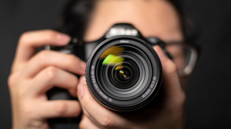 person holding a camera