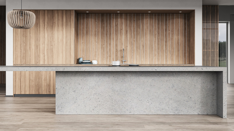 A modern kitchen with concrete countertops