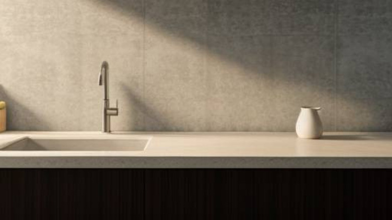A neutral concrete kitchen countertop