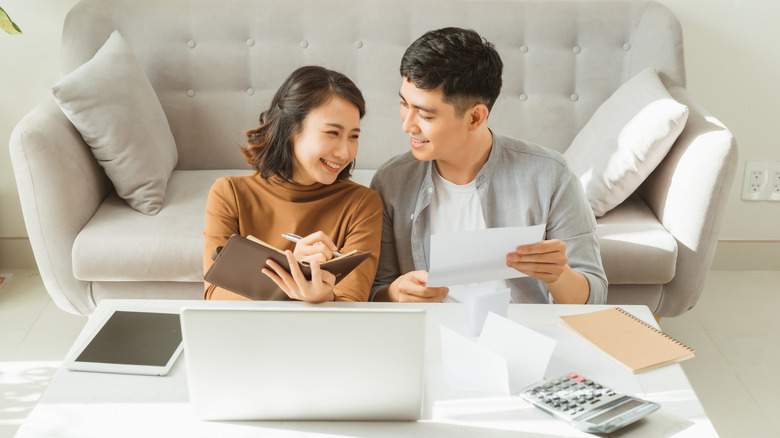 couple looking at documents together