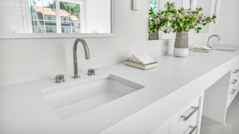 White engineered stone countertop in a bathroom