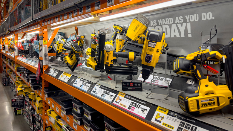 The variety and similarity of DeWalt tools on display in a retail store