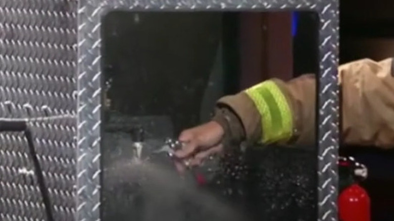 person using Quickstop PRO fire sprinkler tool